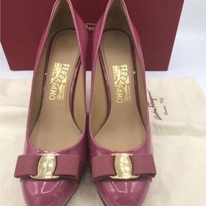 Salvatore Ferragamo Pink Patent Vara Bow Pumps with Gold Accent